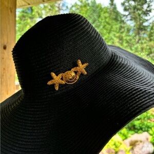 Starfish seashell gold tone brooch